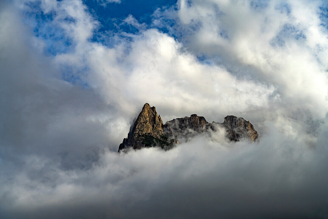 The mountain Schlern in the clouds, Siusi allo Sciliar, South Tyrol, Italy, Europe