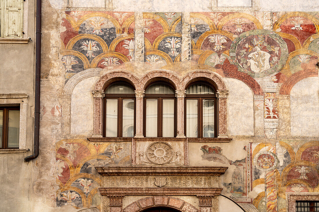 The painted facade of the Palazzo Quetta - Alberti Colico palace in Trento, Trentino, Italy, Europe