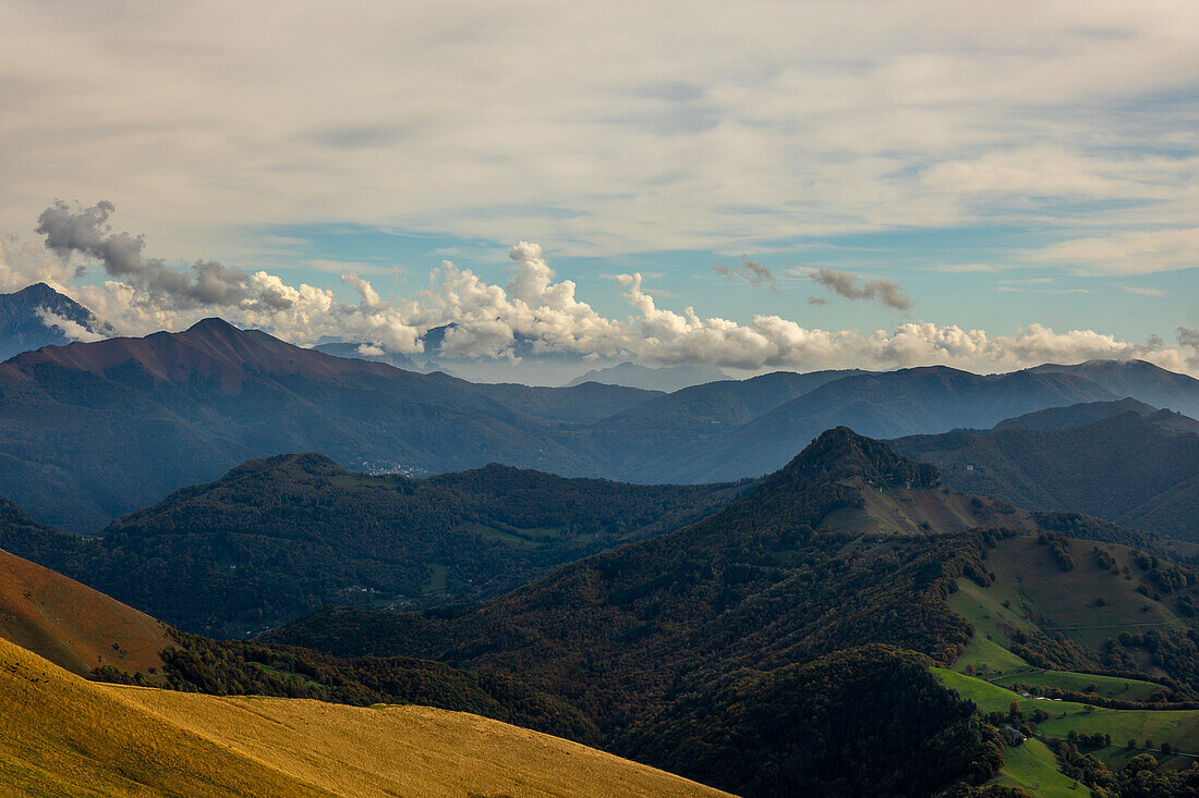 Aerial View over Beautiful Mountainscape with Clouds in a Sunny Day From Monte Generoso, Ticino, Switzerland.