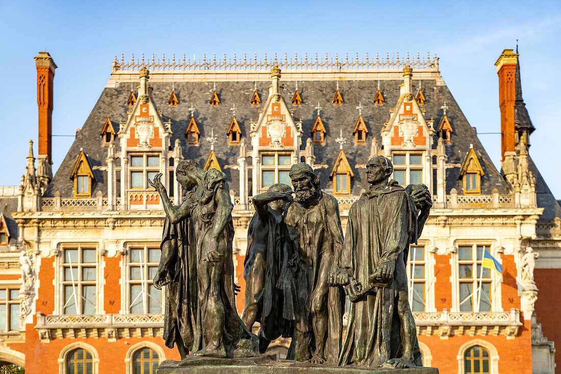 The monument Les Bourgeois de Calais “The Citizens of Calais” by Auguste Rodin in front of the town hall in Calais, France