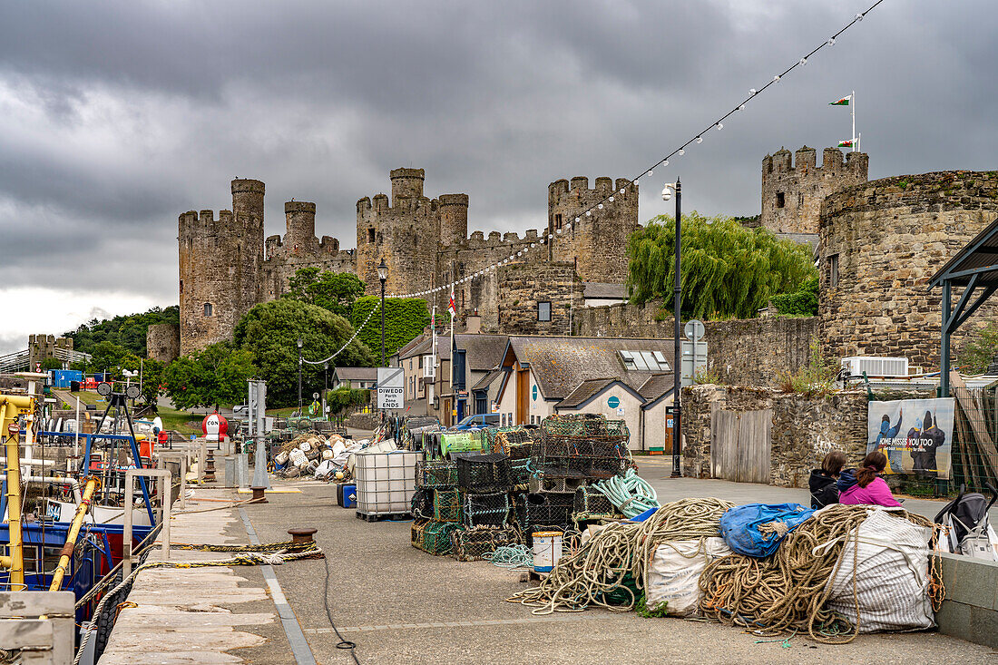 The smallest house in Britain at Fishermen's Quay and Conwy Castle in Conwy, Wales, United Kingdom, Europe