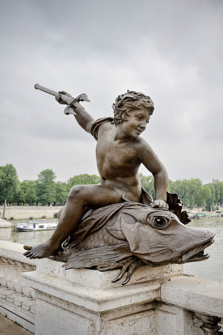 Detail of a figure on the artistically designed arch bridge Pont Alexandre III, Seine river banks, Paris, Île-de-France, France, Europe, UNESCO World Heritage