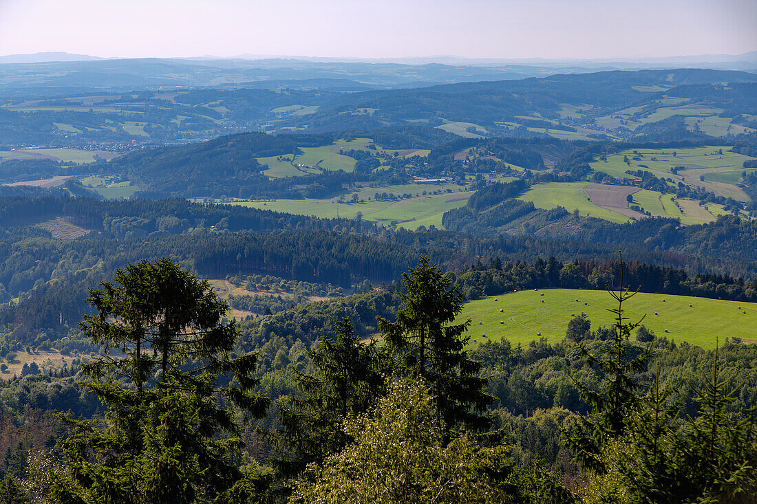 Viewpoint with a view over the Czech Republic towards the Giant Mountains in the rock labyrinth Błędne Skały (Bledne Skaly) in the Hayscheuer Mountains (Góry Stołowe National Park) in the Glatzer Mountains in the Dolnośląskie Voivodeship in Poland