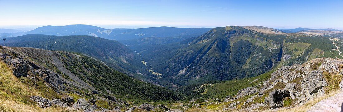 Mountain landscape and view towards Karpacz on the hiking trail to the summit of Sněžka (Śnieżka; Sniezka) in the Giant Mountains National Park (Karkonoski Park Narodowy) in the Dolnośląskie Voivodeship in Poland