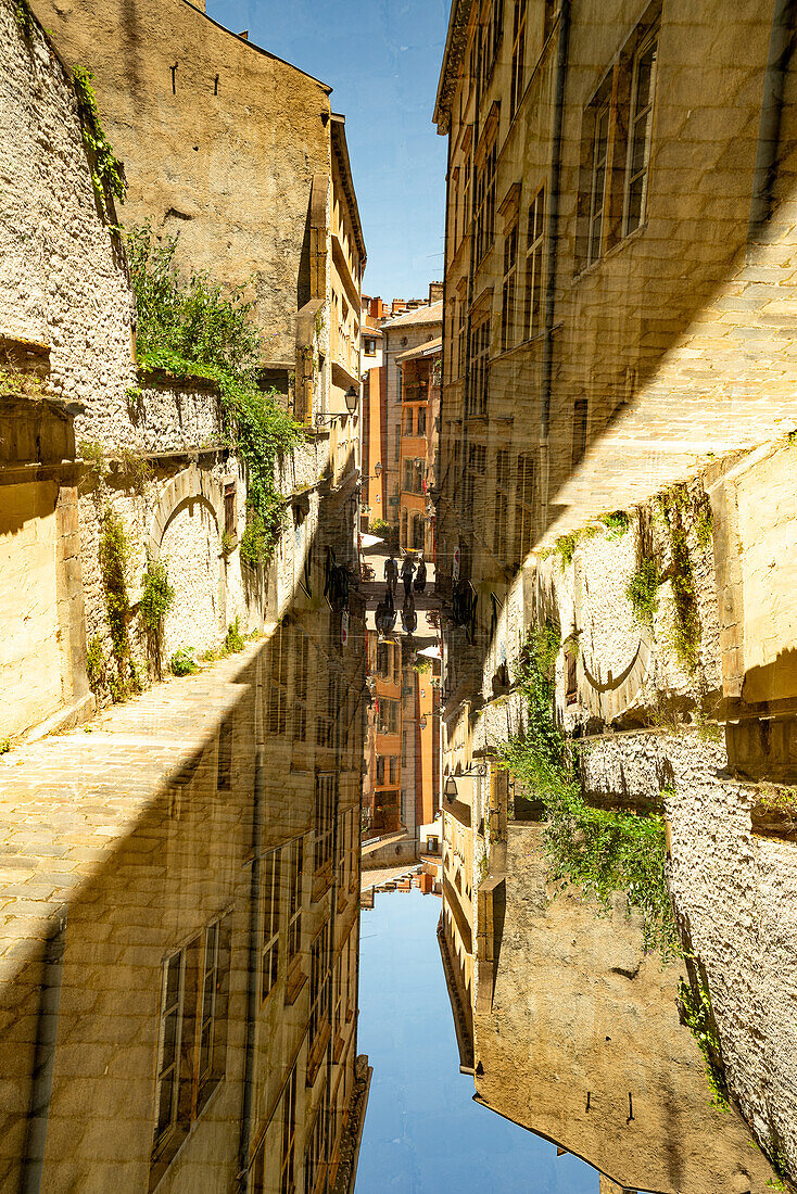 Double exposure of a medieval street in Lyon, France.