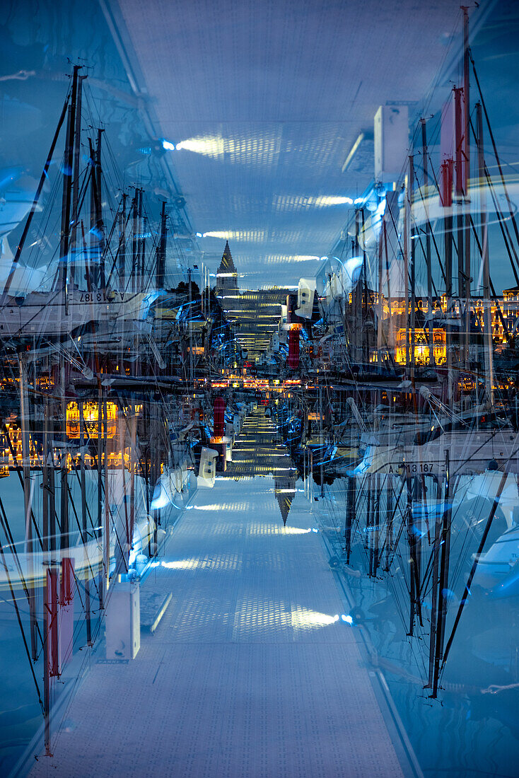 Double exposure of the yacht harbour of Marseille by  the twilight of dusk.