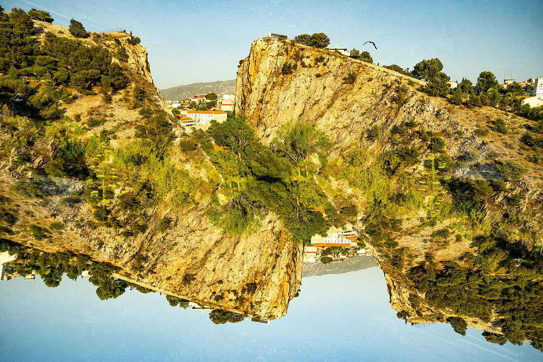 Double exposure of a large rocky hill in Marseille, France.