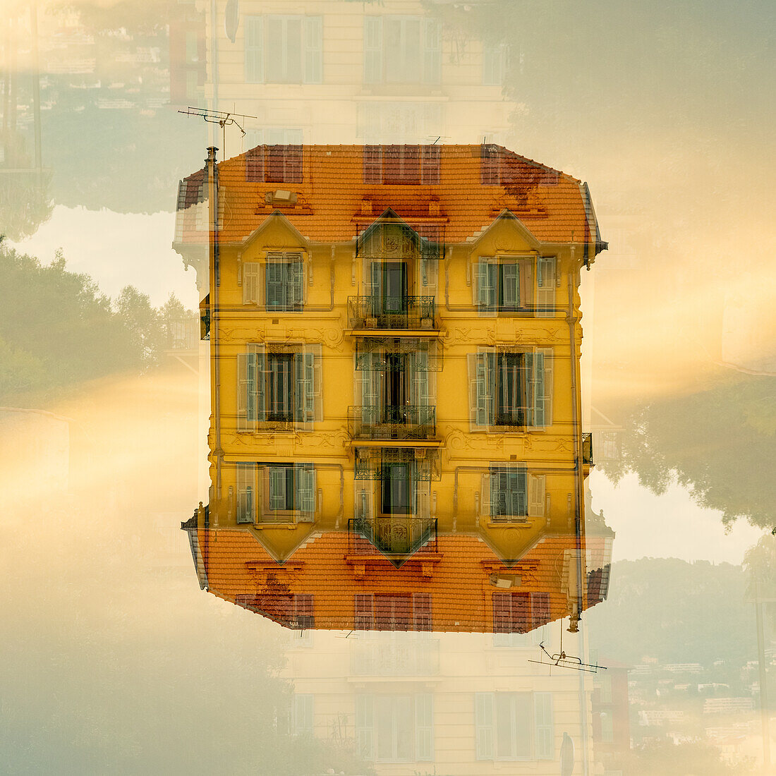 Double exposure of a yellow house in Nice, France.