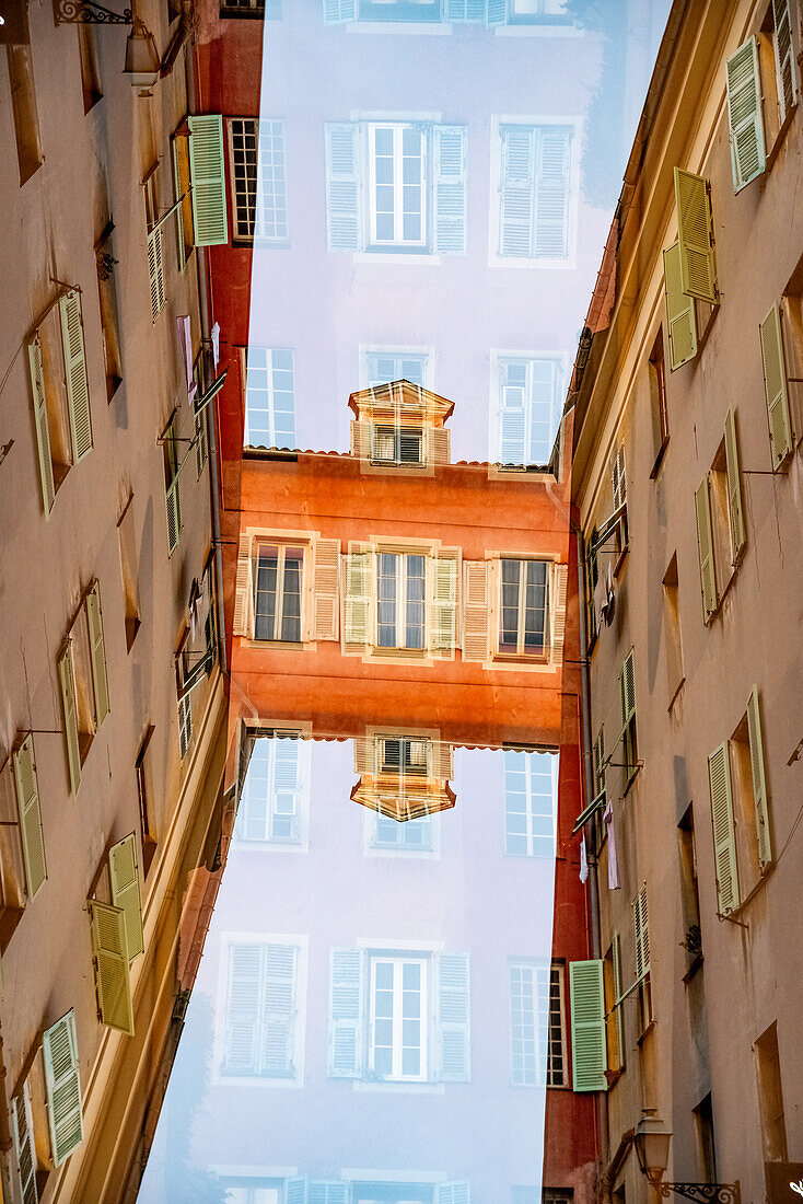 Graphic double exposure of residential buildings in Nice, France.