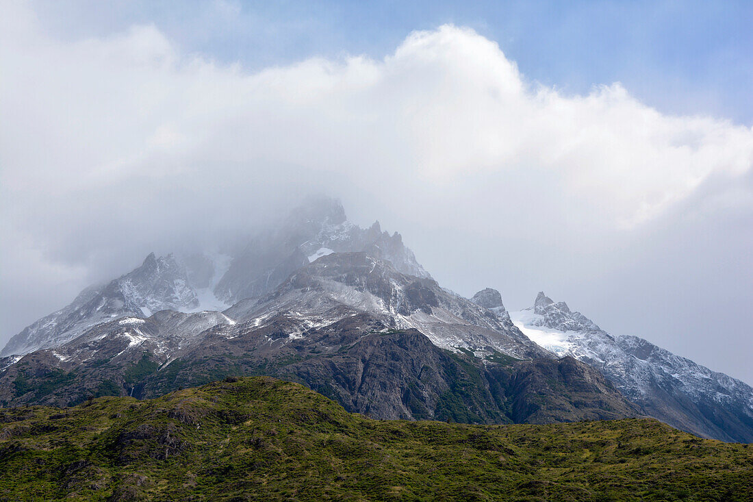 Chile; Southern Chile; Magallanes Region; Mountains of the southern Cordillera Patagonica; Torres del Paine National Park; Clouds over the summit of Cerro Paine Grande