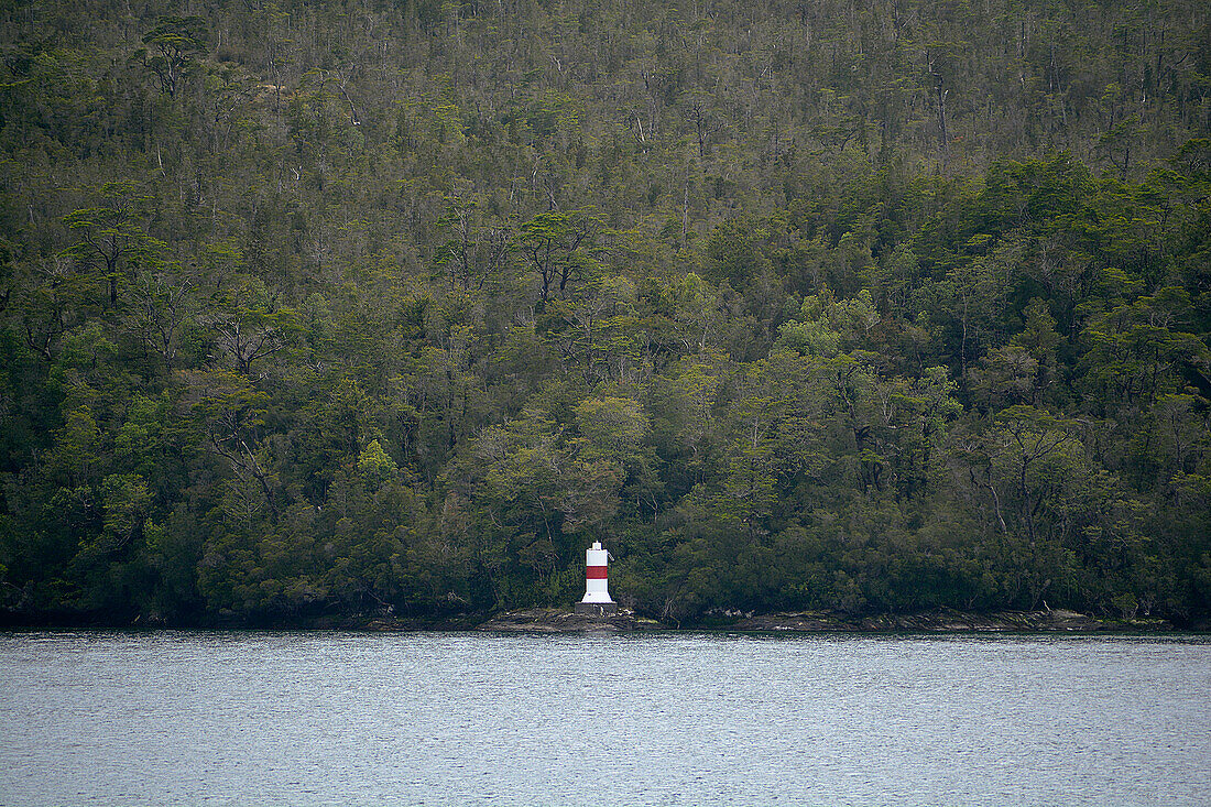 Chile; Southern Chile; Aysen region; Mountains of the southern Cordillera Patagonica; on the Navimag ferry through the Patagonian fjords; Lighthouse in the Polluche Canal