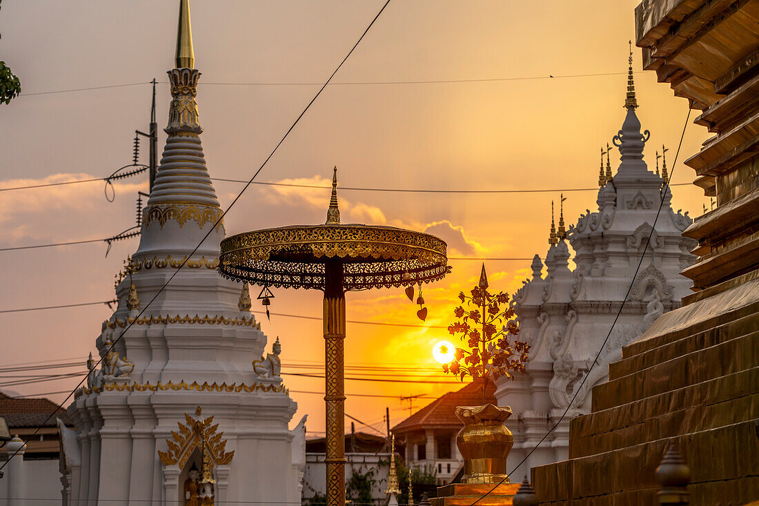 Sunset at the Buddhist temple Wat Phra That Si in Chom Thong, Thailand, Asia
