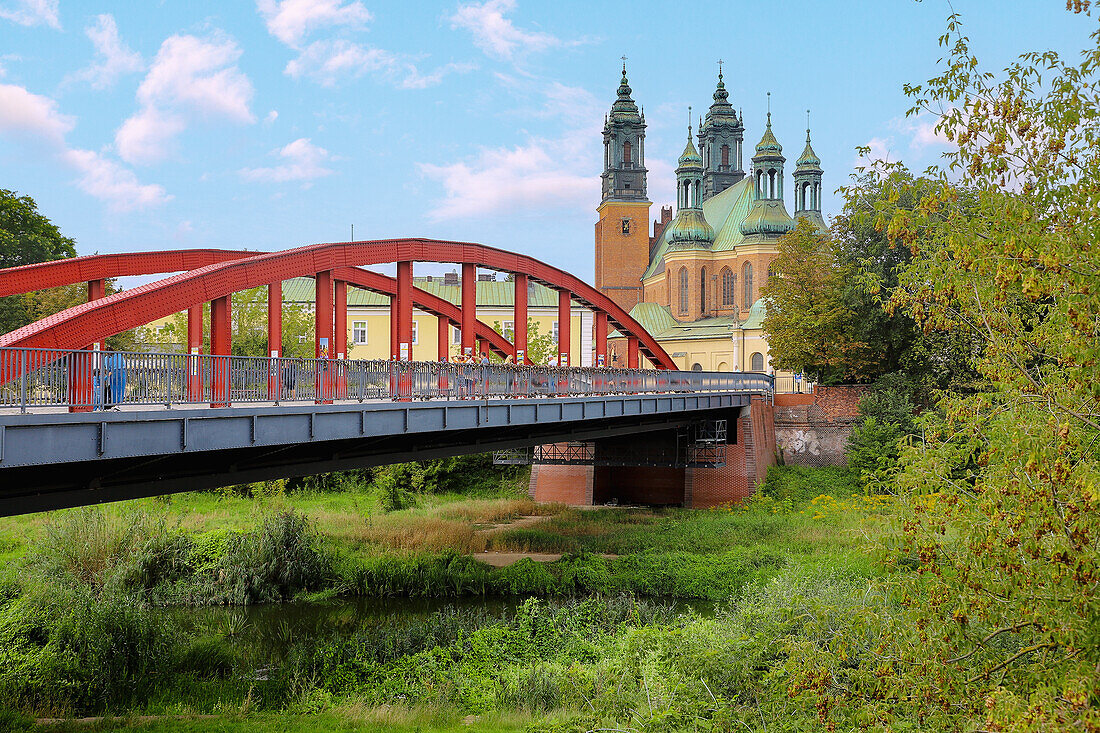 Boleslaw Chrobry Bridge (Most Bolesław Chrobrego) over the Warta to the Cathedral Island (Ostrów Tumski) with Poznań Cathedral (St. Peter and Paul Cathedral, Katedra) in Poznań (Poznan; Posen) in the Wielkopolska Voivodeship of Poland