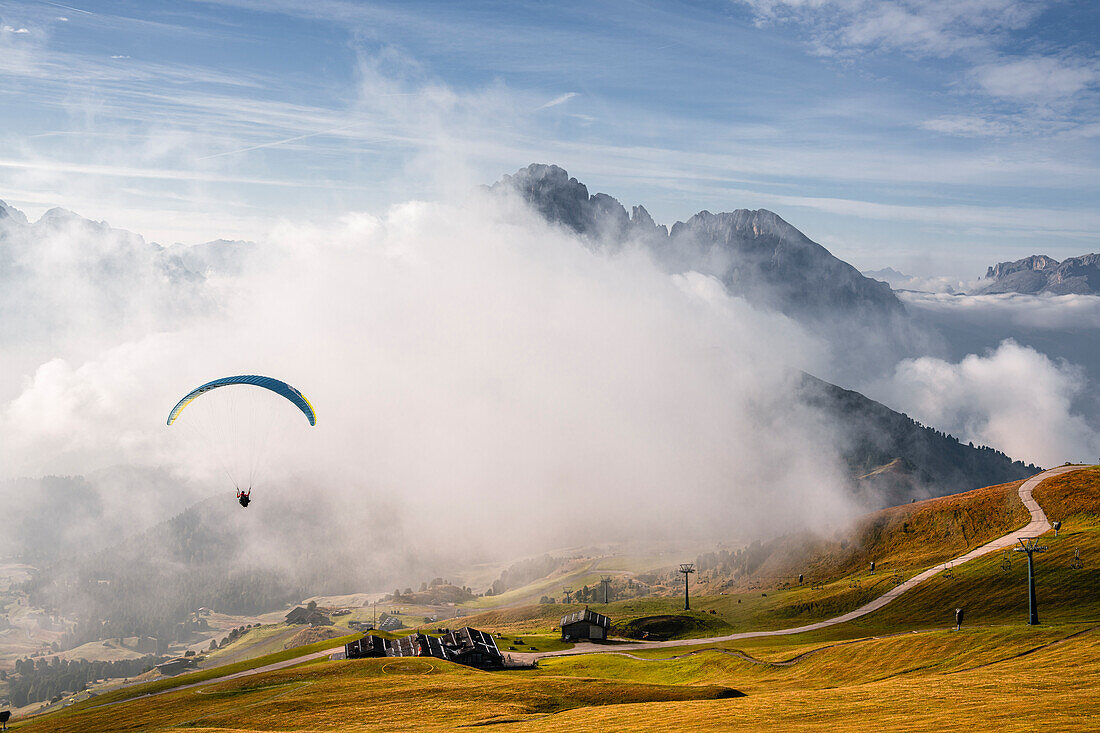 Paragliders at the Seceda in autumn, Val Gardena, Bolzano, South Tyrol, Italy