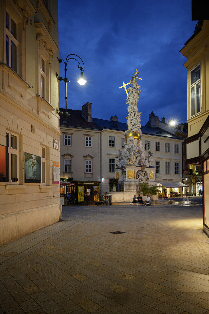  UNESCO World Heritage &quot;The Important Spa Cities of Europe&quot;, Trinity or Plague Column (by the sculptor Giovanni Stanetti) on the main square of Baden near Vienna at night, Lower Austria, Austria, Europe 