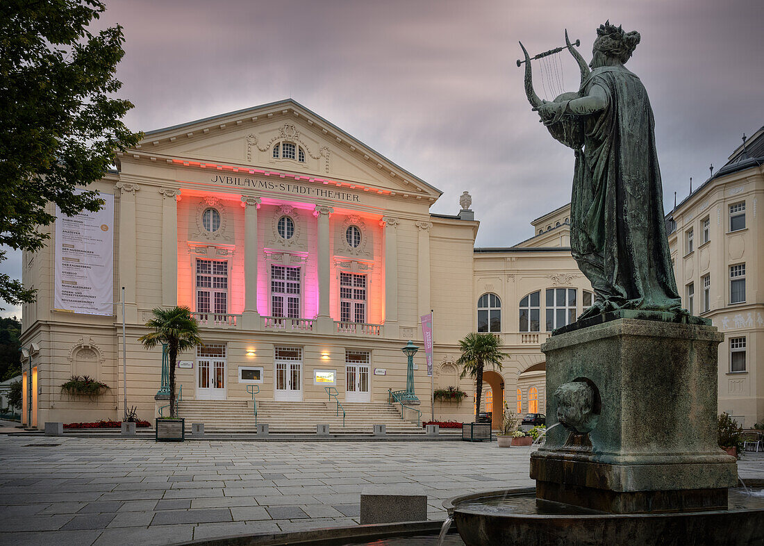  UNESCO World Heritage Site &quot;The Important Spa Towns of Europe&quot;, Erato in the fountain in front of the colorfully lit city theater, Baden near Vienna, Lower Austria, Austria, Europe 