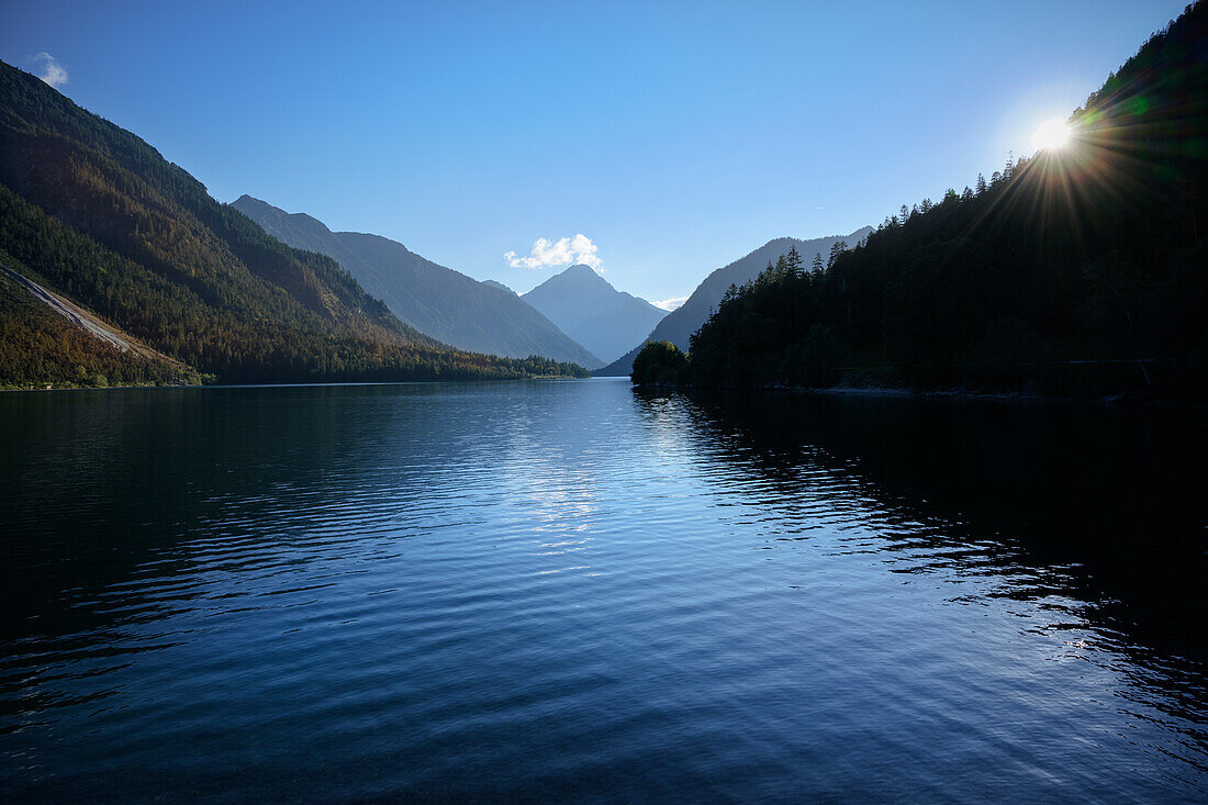  Plansee in the backlight, Reutte district, Ammergau Alps, Tyrol, Austria, Europe 