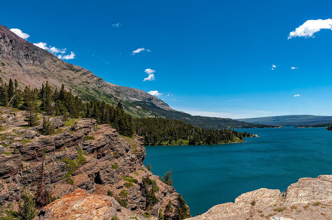 Mountains, Lakes and trees from Sunspot Point in Glacier National Park