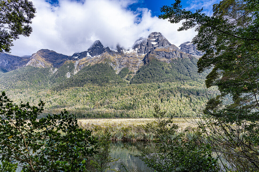 Beautiful blue sky and the Southern Alps reflected in Mirror lakes