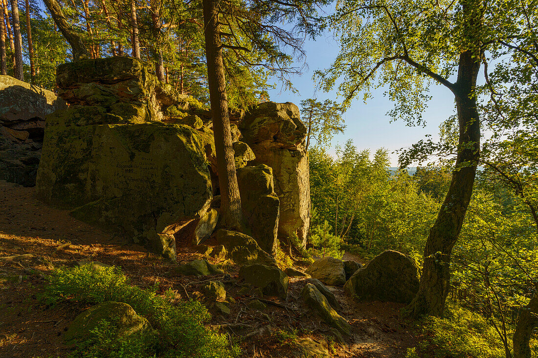 Sunset over the Veitenstein rock group near Lußberg, Haßberge Nature Park, Lower Franconia, Bavaria, Germany