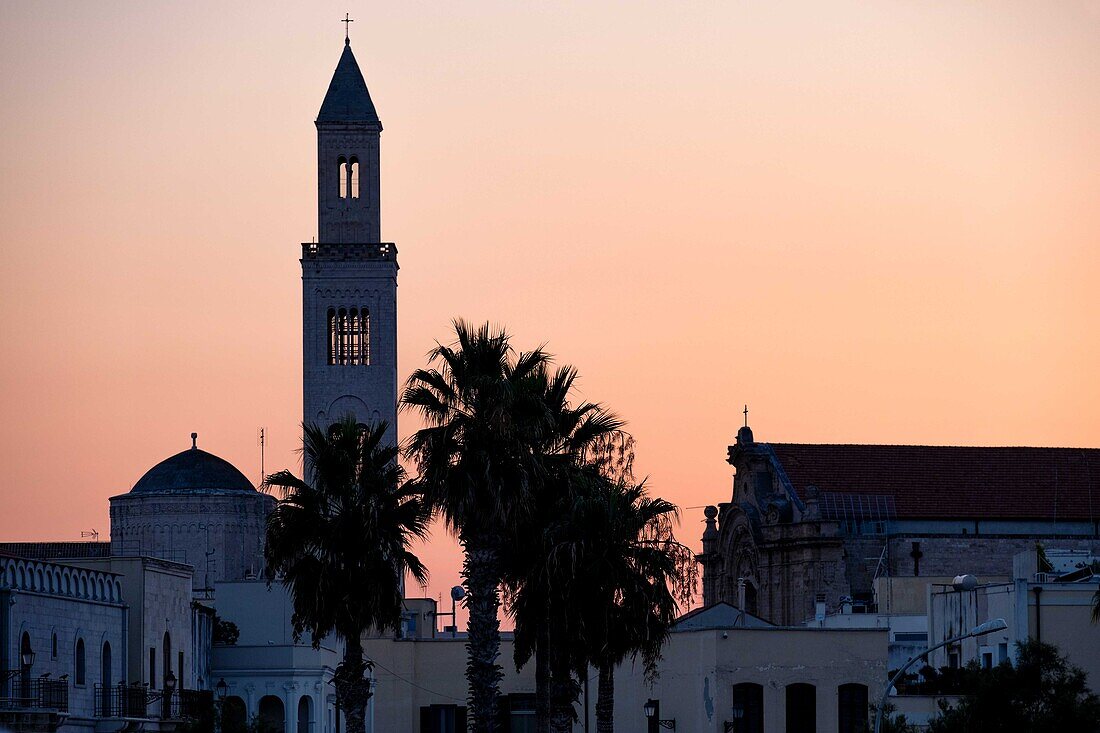 View of the church tower of the San Sabino Cathedral backlit at sunset, Bari, Apulia, Italy, Europe