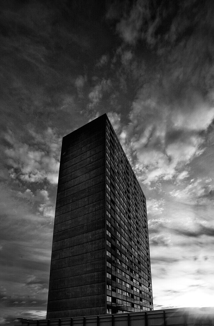 High-rise building from below rises into the sky