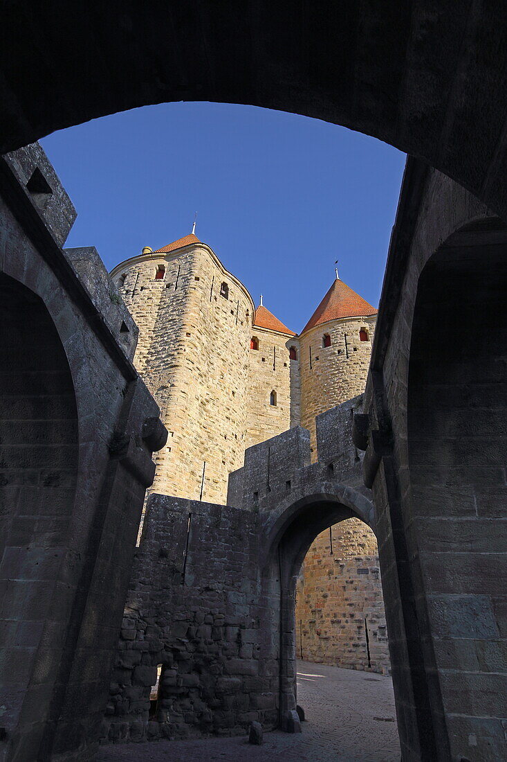  The Porte Narbonnaise is part of the medieval city fortifications of the Cité de Carcassonne, Carcassonne, Aude department, Occitanie, France 