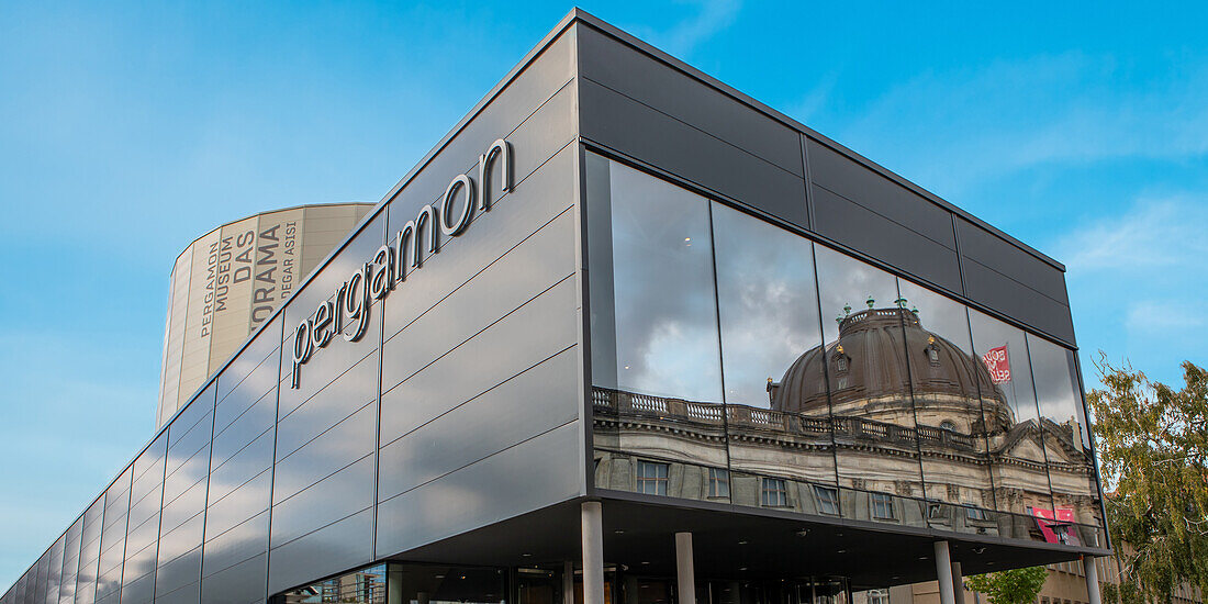  Tradition and modernity: The Bodemuseum is reflected in the Panorama Pergamon, Am Kupfergraben, Berlin, Germany 