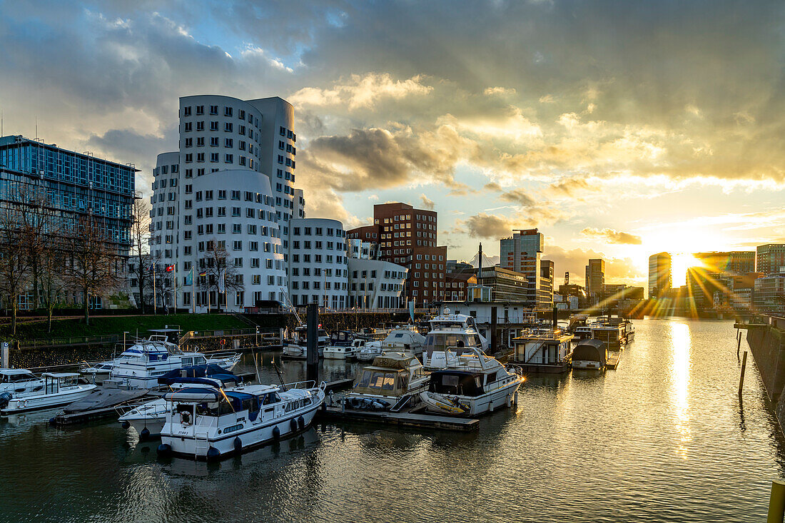  Gehry buildings - Neuer Zollhof at the Medienhafen in Düsseldorf at sunset, North Rhine-Westphalia, Germany 