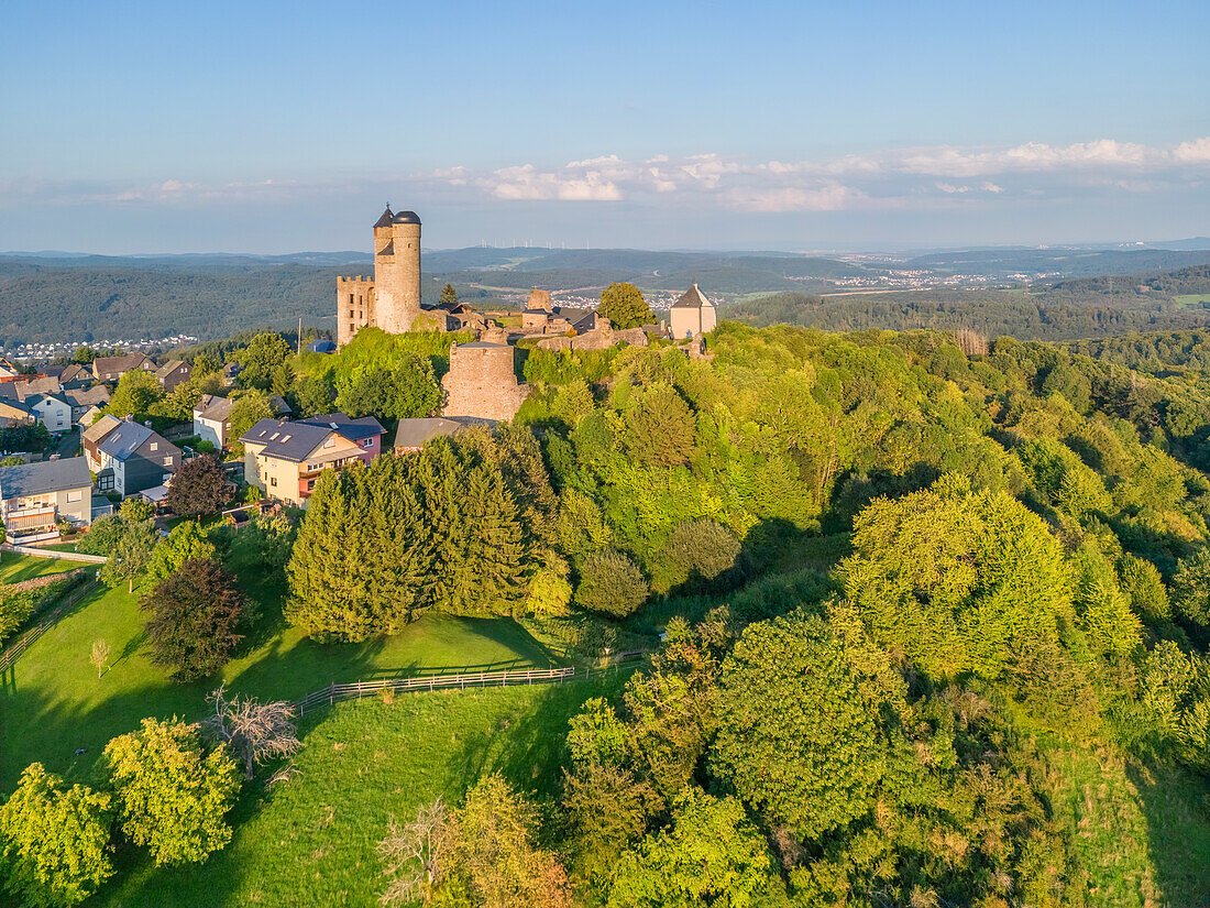  Aerial view of Greifenstein Castle in the evening light, Bell Museum, Lahn-Dill District, Westerwald, Hesse, Germany 