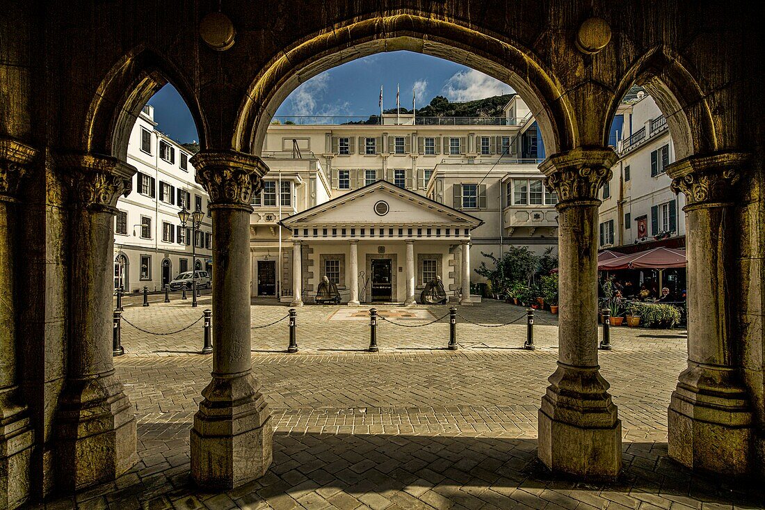  View through a portal of Convent Place Square and the guardhouse of the Governor&#39;s Residence of Gibraltar, British Crown Colony, Iberian Peninsula 