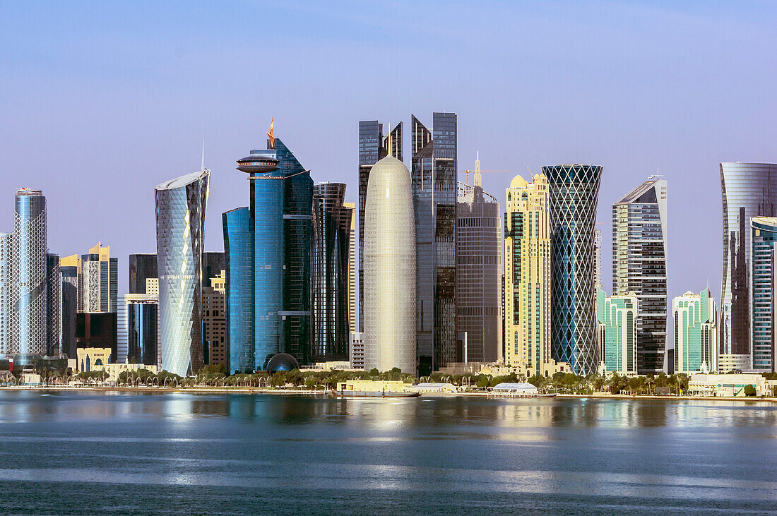  Harbor views, the Corniche with skyscrapers and ships in Doha, capital of Qatar in the Persian Gulf. 