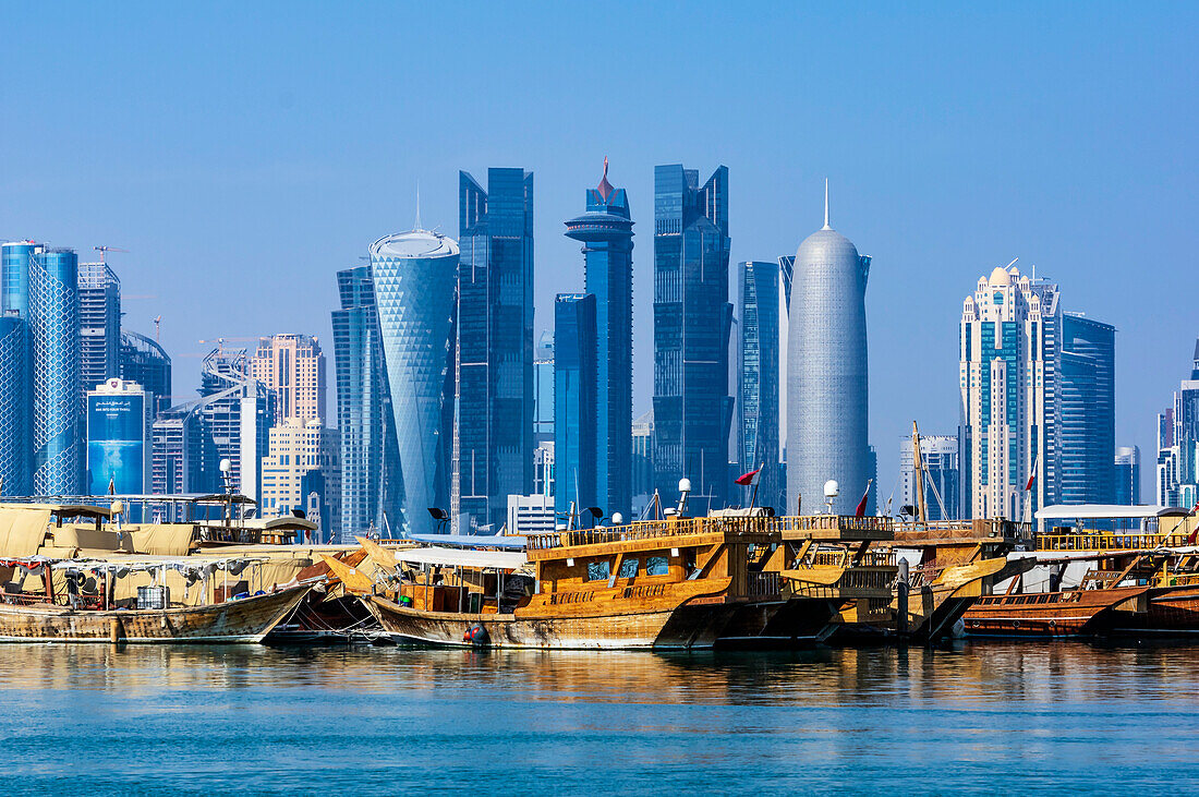  Harbor views with skyscrapers and ships in Doha, capital of Qatar in the Persian Gulf. 