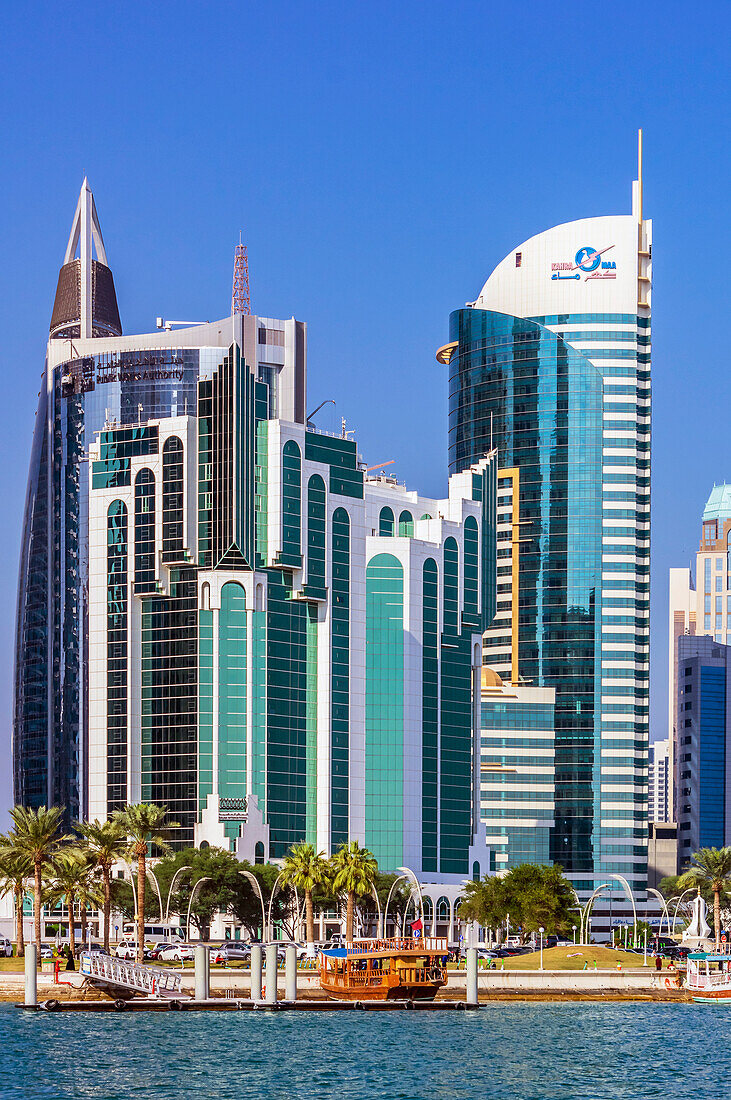  Harbor views with skyscrapers and ships in Doha, capital of Qatar in the Persian Gulf. 