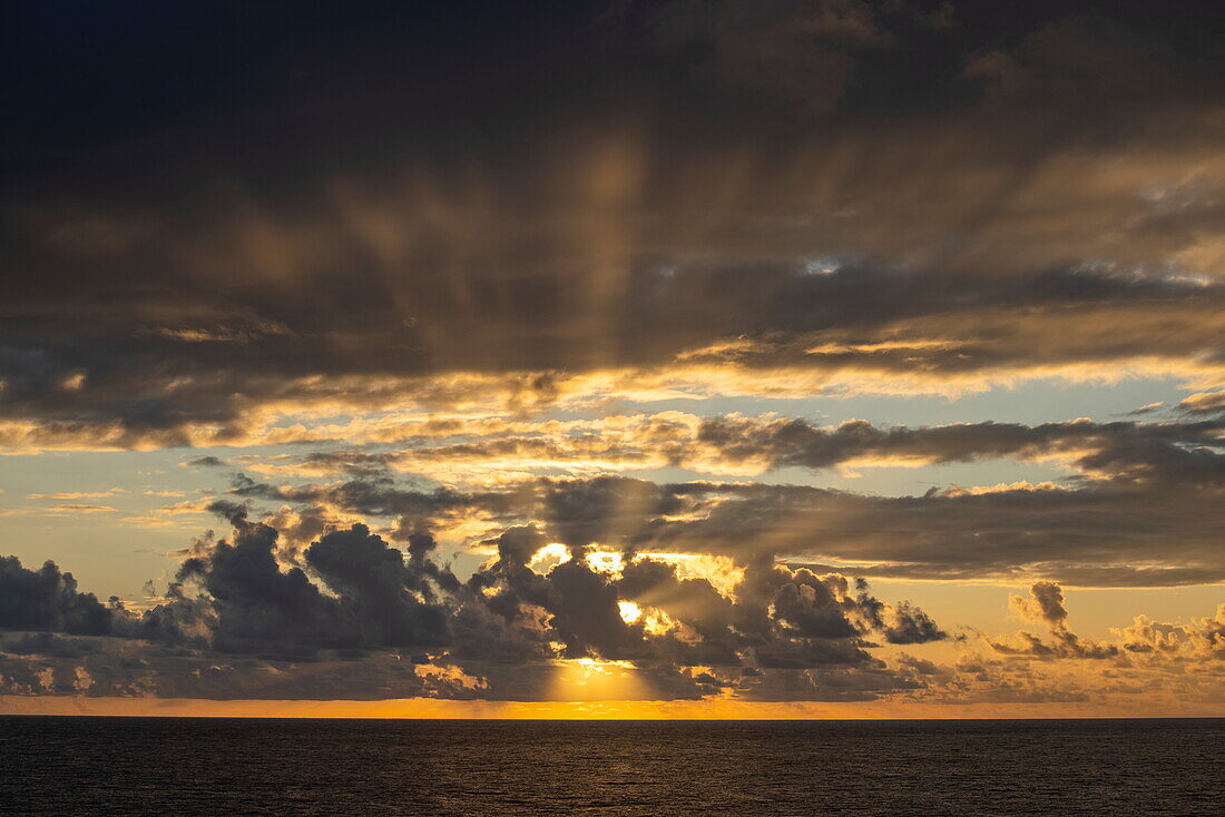  Dramatic clouds at sunset seen from expedition cruise ship SH Diana (Swan Hellenic) in the Gulf of Aden, at sea, near Somalia, Middle East 