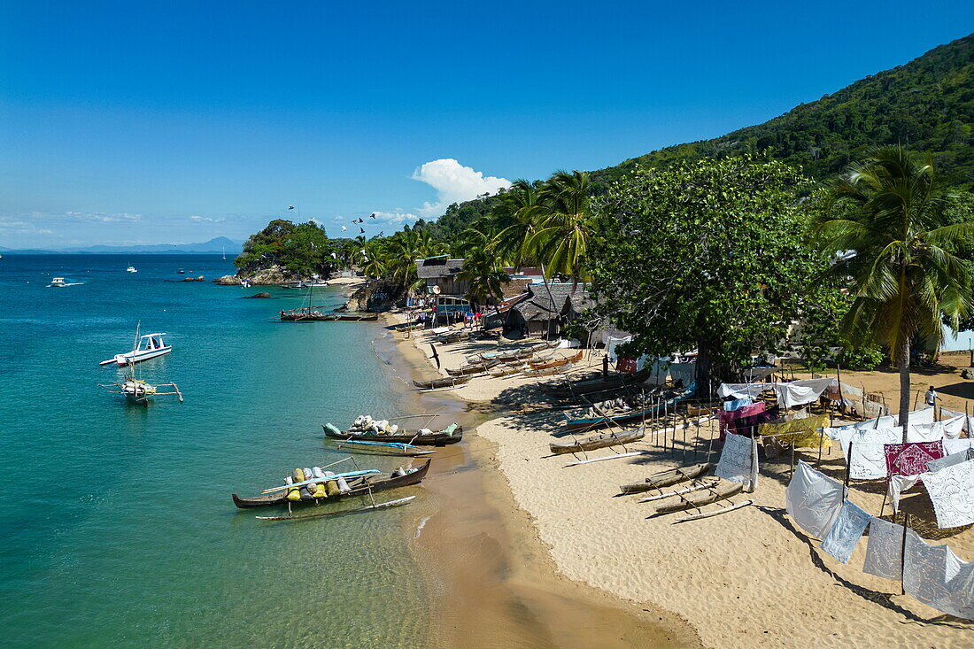  Aerial view of boats, beach and village, Nosy Komba, Diana, Madagascar, Indian Ocean 