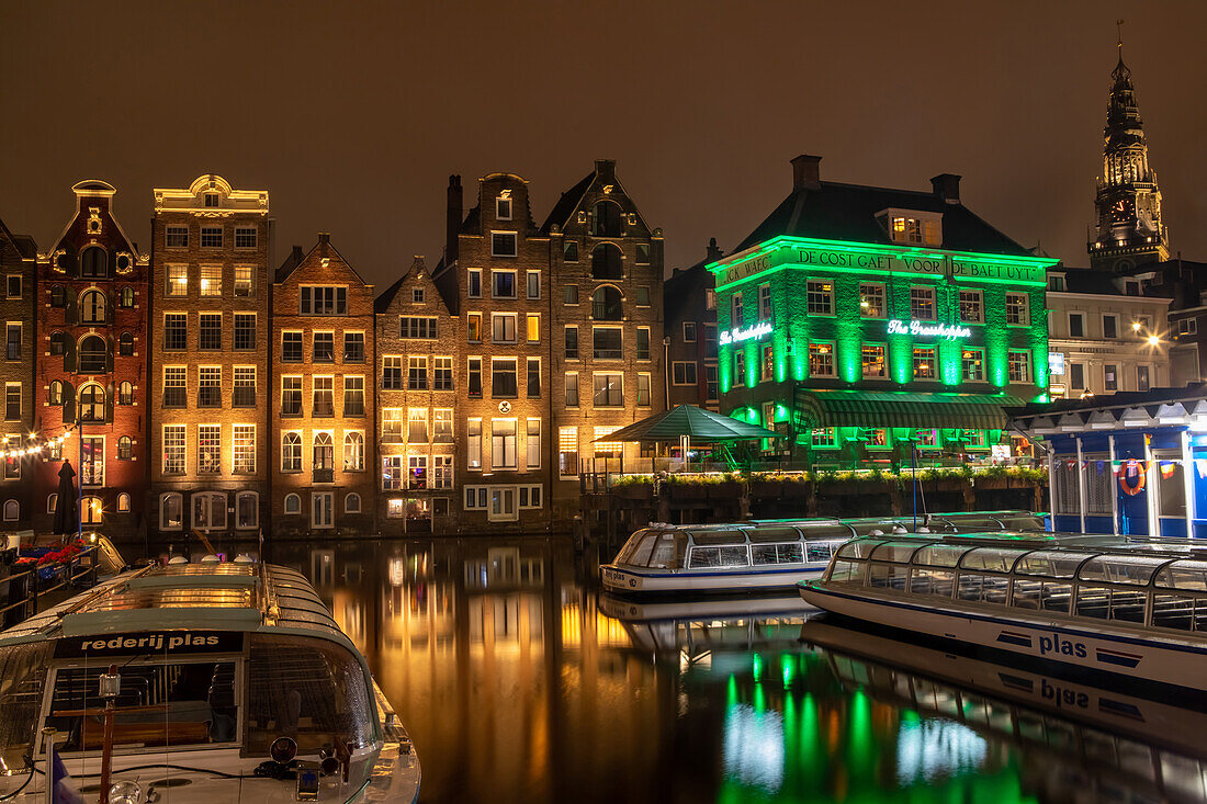  Canal houses reflected in the water, Amsterdam, Netherlands 