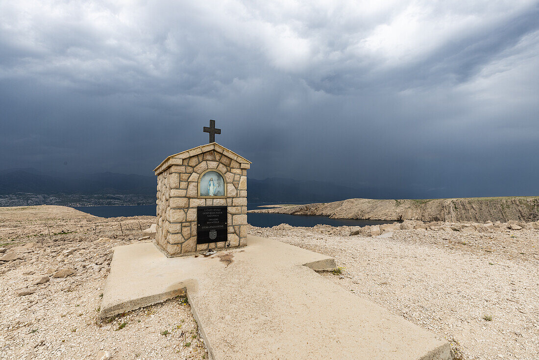  Dark clouds over Pag island, Metajna, Croatia, Europe 