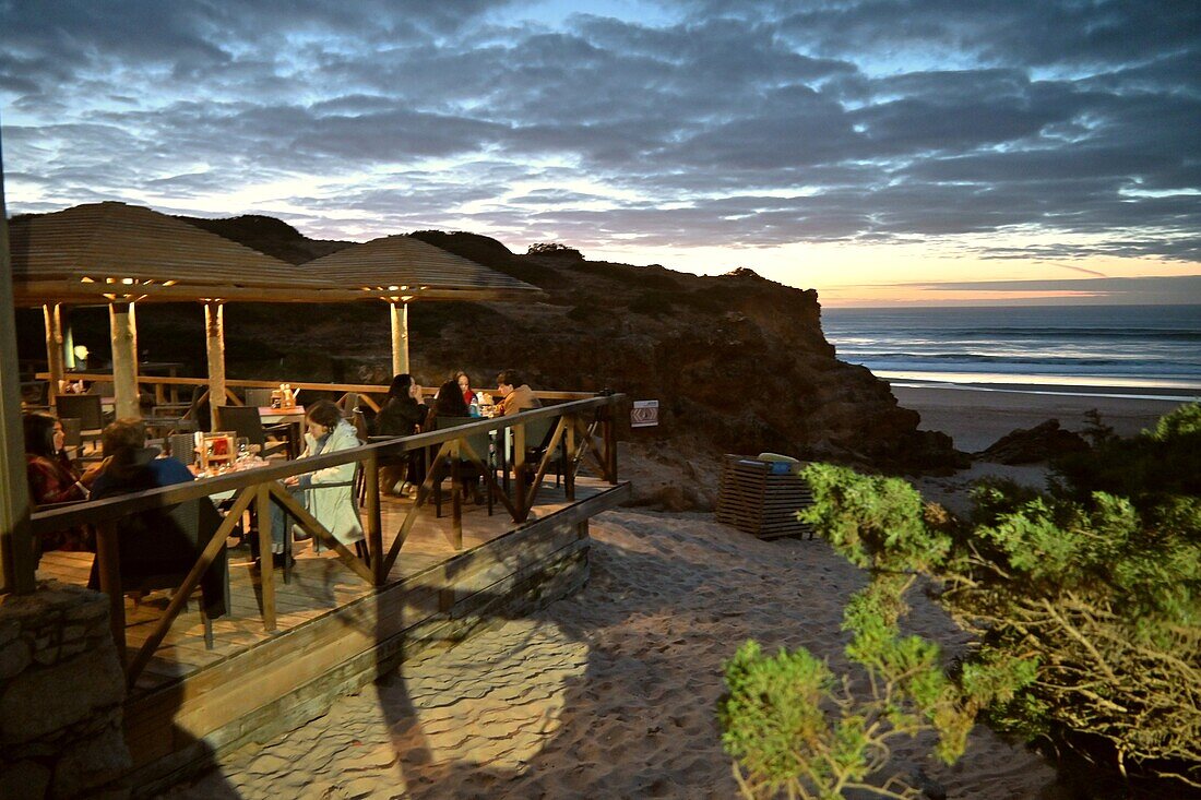  on the Atlantic Ocean, sunset at Praia do Guincho near Cascais, Portugal 