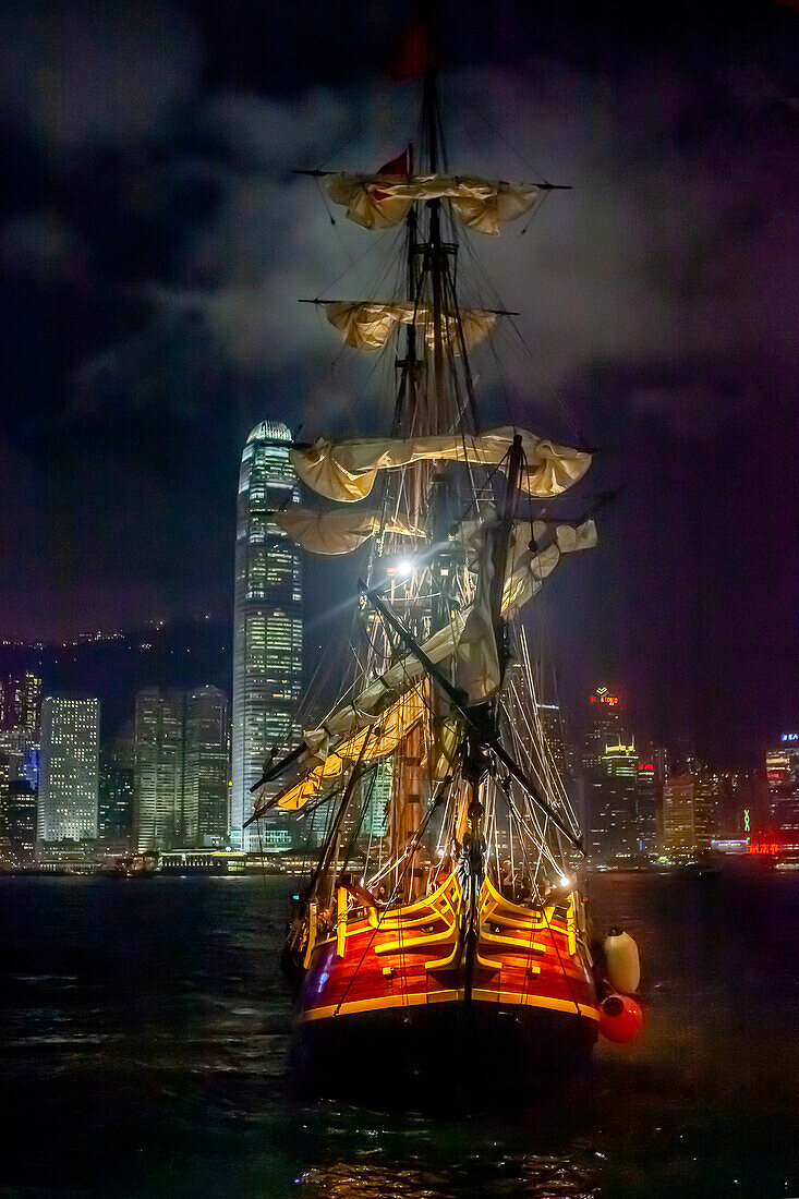  Sailing ship in front of the skyline of Hong Kong Island, Hong Kong 