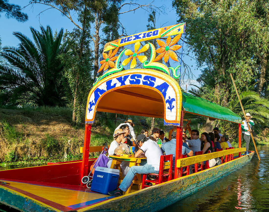 Popular tourist attraction boating Xochimiloco, Mexico City, Mexico