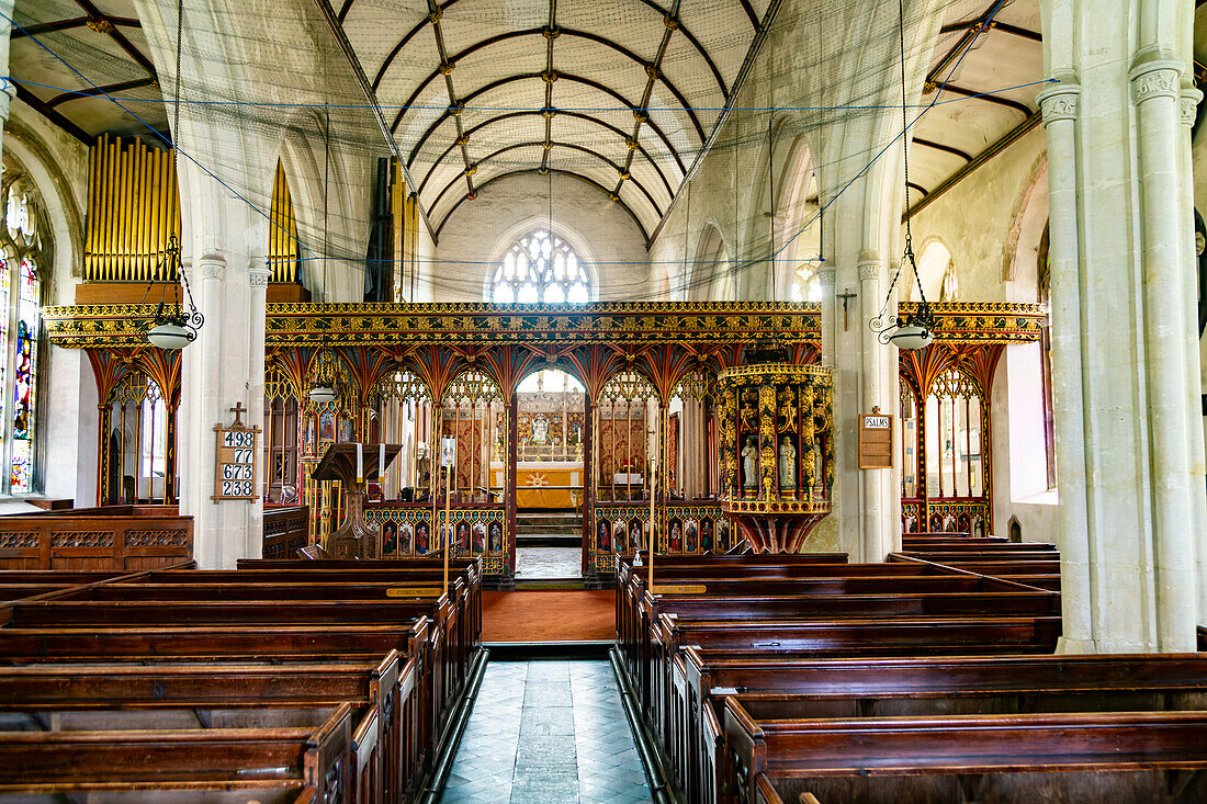 View from nave to rood screen inside village parish church of Saint Andrew, Harberton, south Devon, England, UK