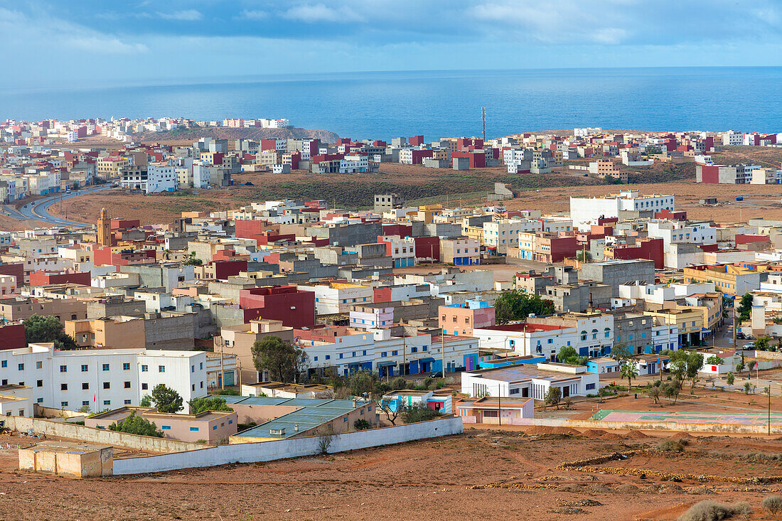 Oblique view over coastal town to Atlantic Ocean, Mirleft, southern Morocco, North Africa