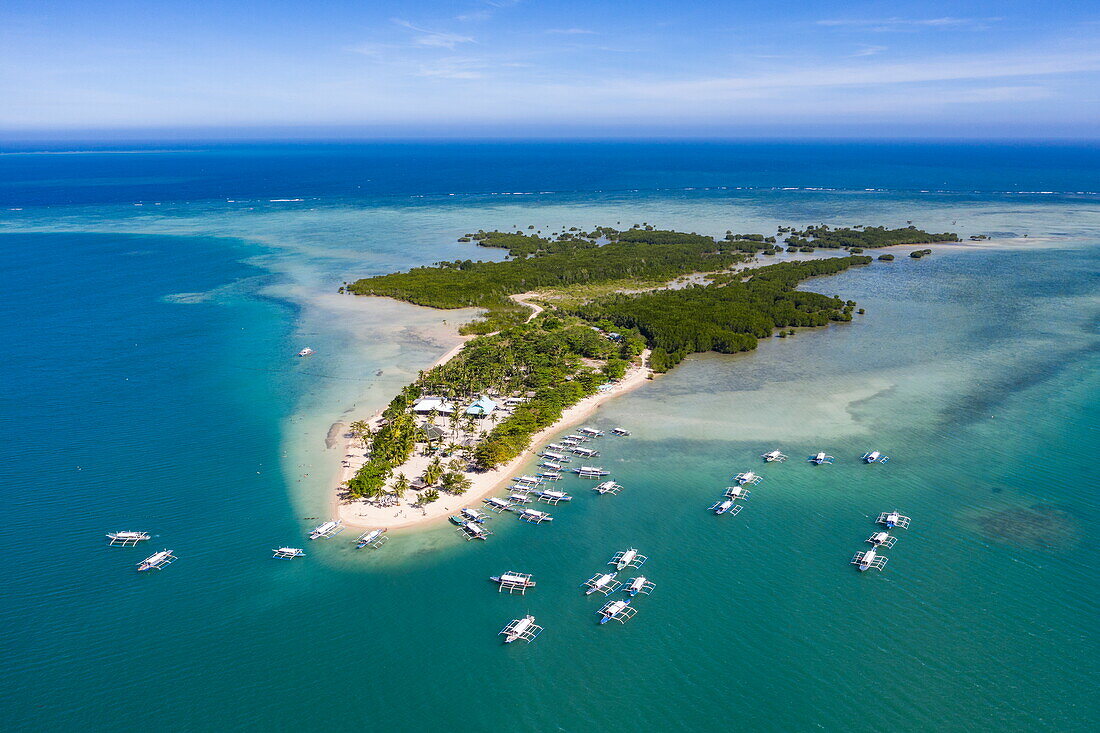  Aerial photographs of Bangka outrigger canoe tour boats on Cowrie Island, Honda Bay, near Puerto Princesa, Palawan, Philippines 