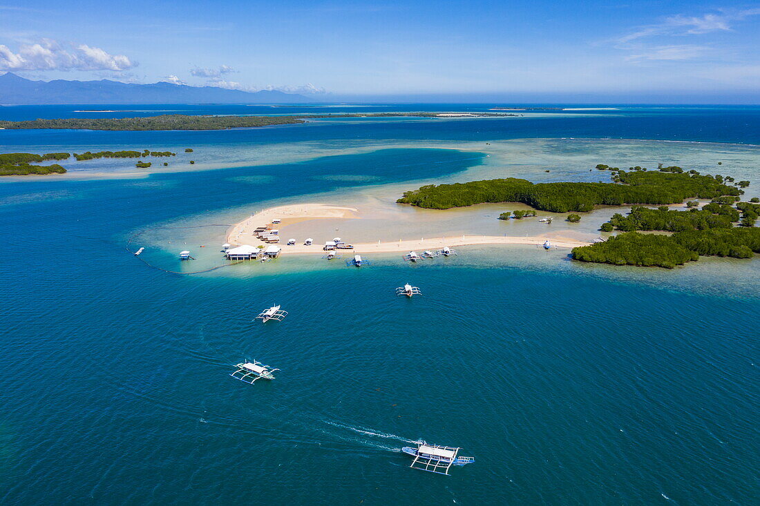  Aerial photographs of sandbar and Bangka outrigger canoe tour boats on Luli Island, Honda Bay, near Puerto Princesa, Palawan, Philippines 