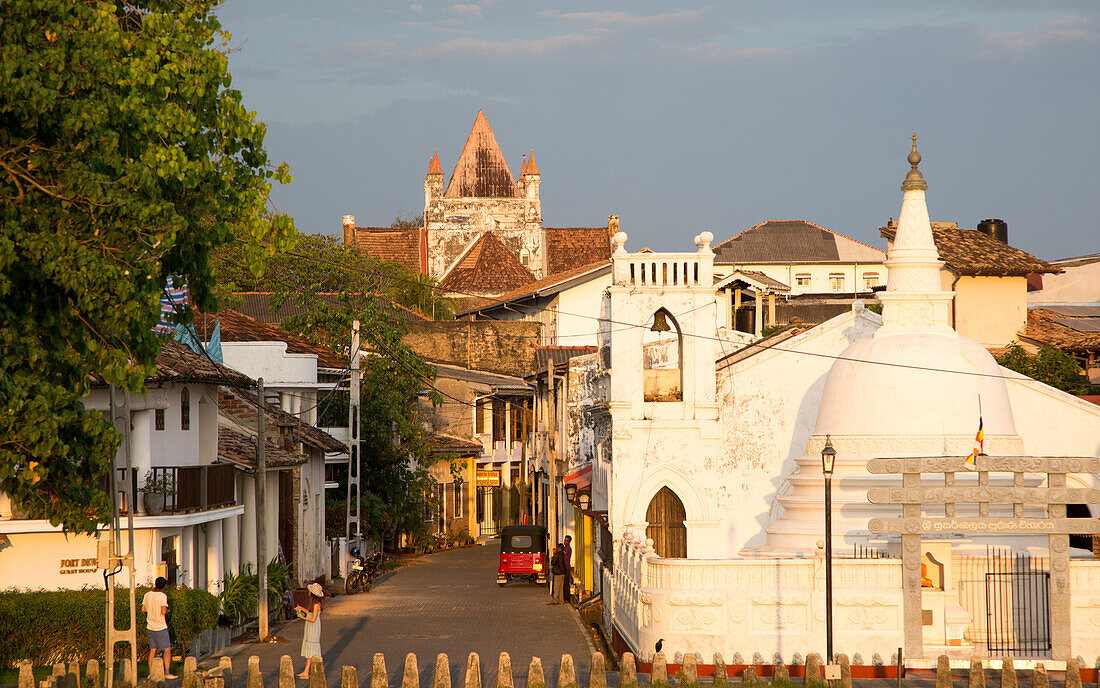 Street and house in historic town of Galle, Sri Lanka, Asia with Christian church and Buddhist temple