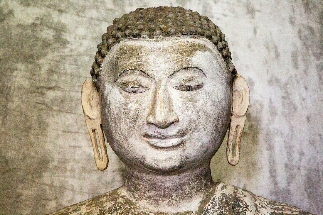 Buddha figure inside Dambulla cave Buddhist temple complex, Sri Lanka, Asia