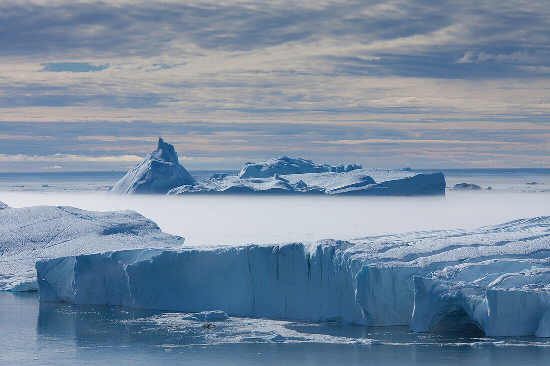  Iceberg in cold mist, Kangia Icefjord, UNESCO World Heritage Site, Disko Bay, West Greenland, Greenland 