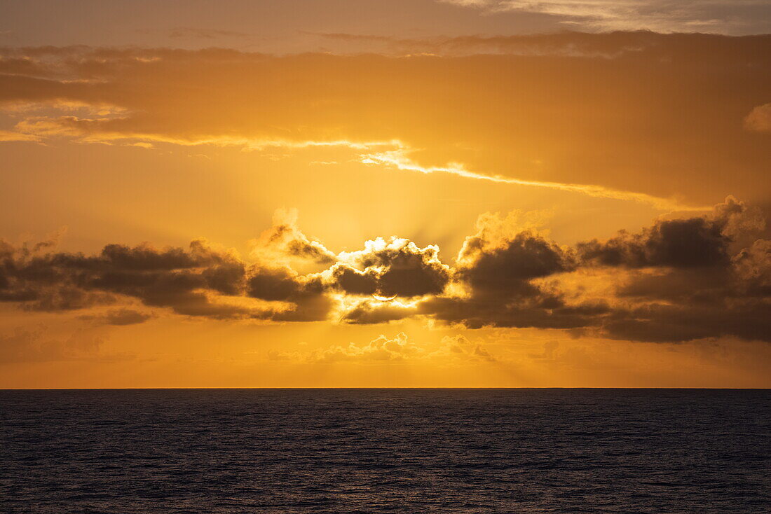  Dramatic clouds at sunset seen from the cruise ship Vasco da Gama (nicko cruises), at sea, South Pacific 