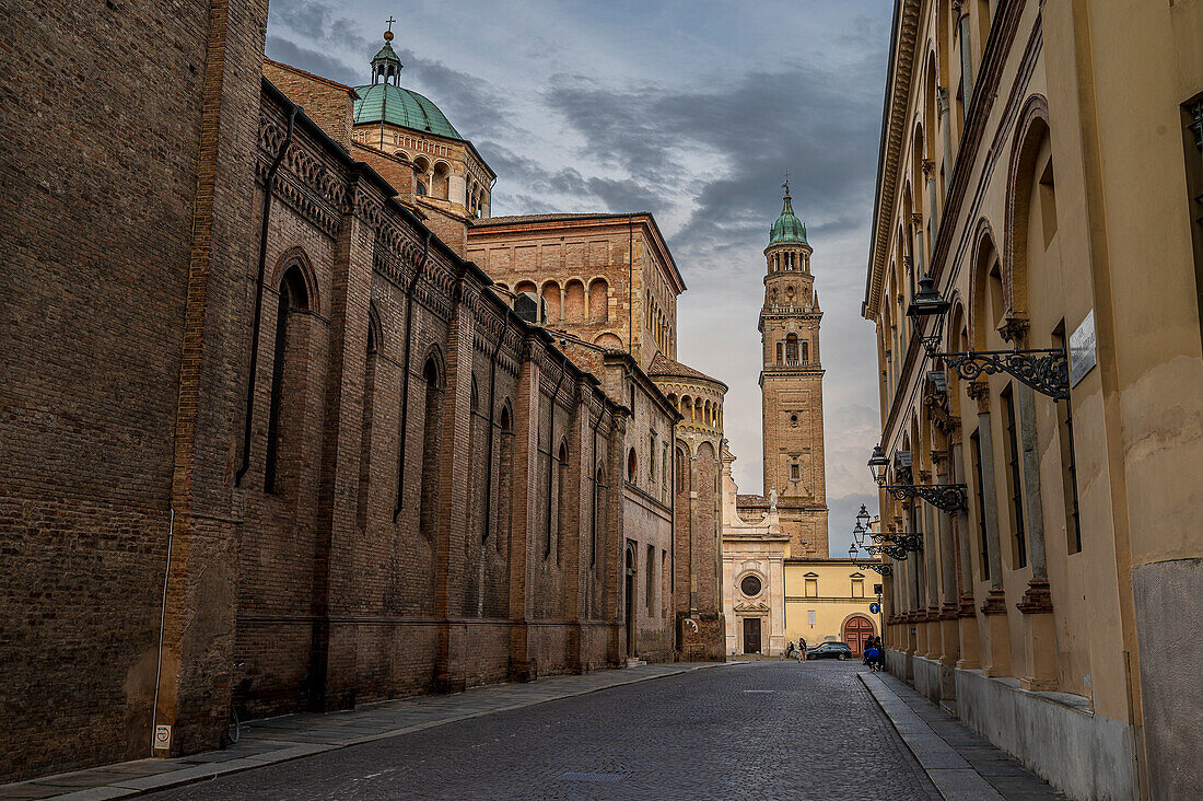  View of the church tower of San Giovanni Evangelista, cathedral on the left sideParma, Province of Parma, Emilia-Romagna, Italy, Europe 